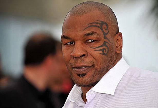 Mike Tyson Appears to Strike a Passenger on a Plane after being harassed