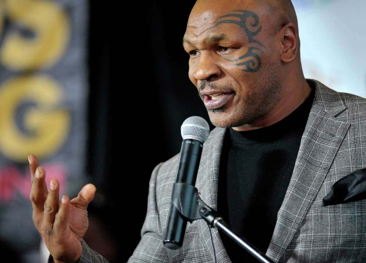 Mike Tyson Appears to Strike a Passenger on a Plane after being harassed